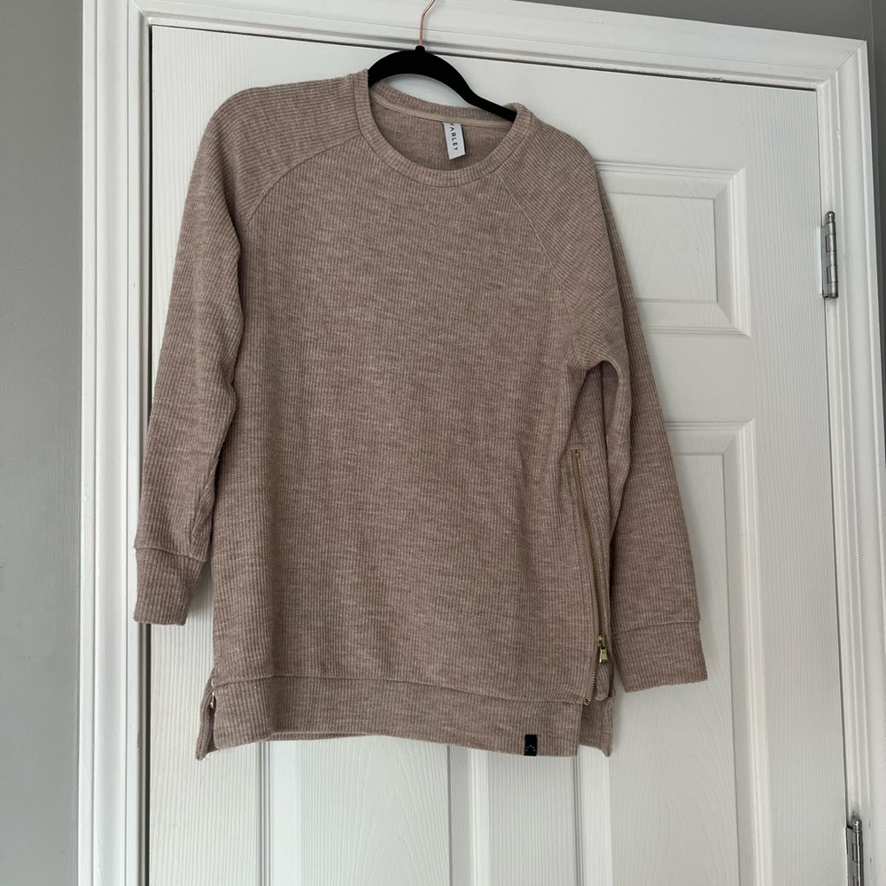 Tan Varley sweater with zipper details on side. Size medium